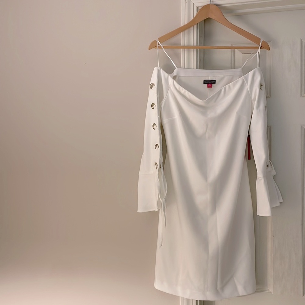 White strapless flounce laced sleeve dress. Size small.